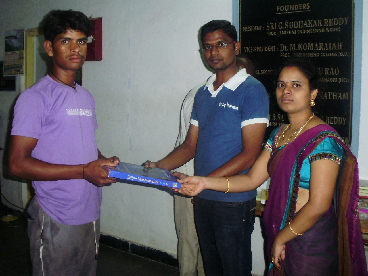 Giving textbooks and educational material to students